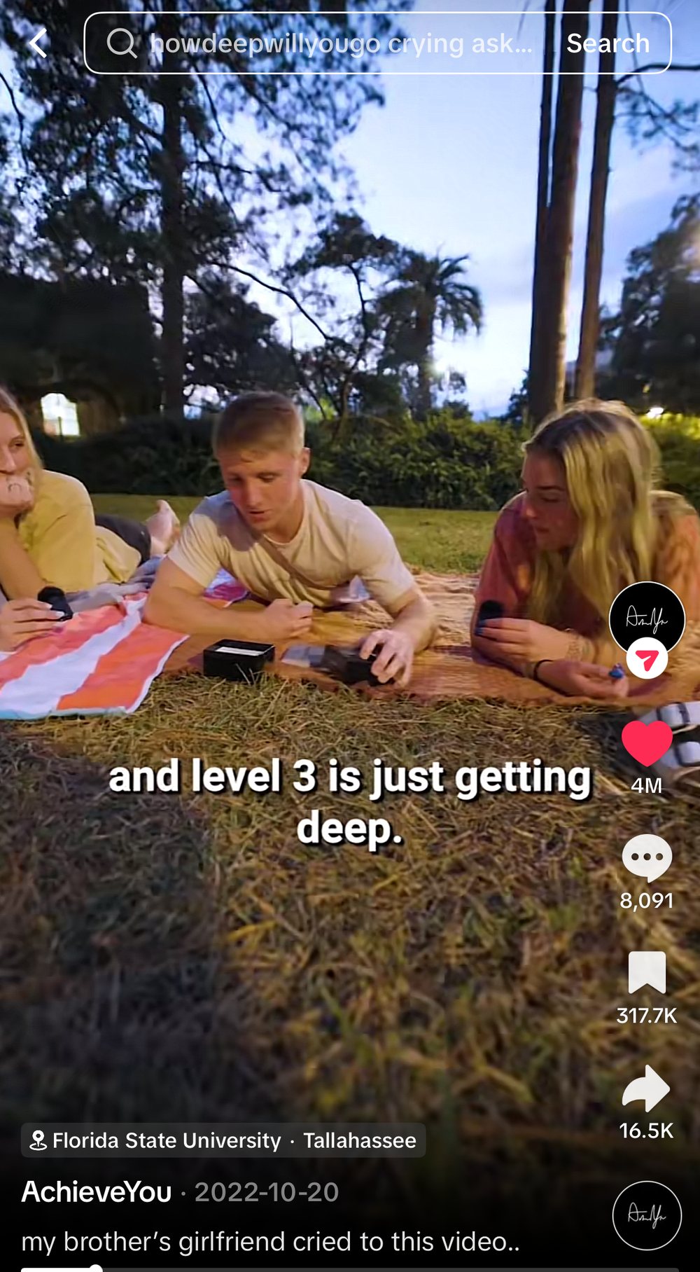 Emily, Taylor and Stain playing on the grass in the video that reached 22 million views